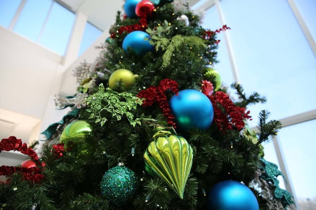 Christmas tree with green and blue ornaments.